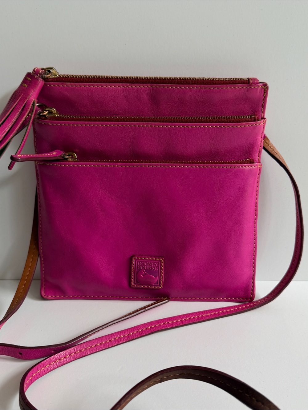 Dooney & Bourke Fuchsia Leather Triple-Zip Crossbody